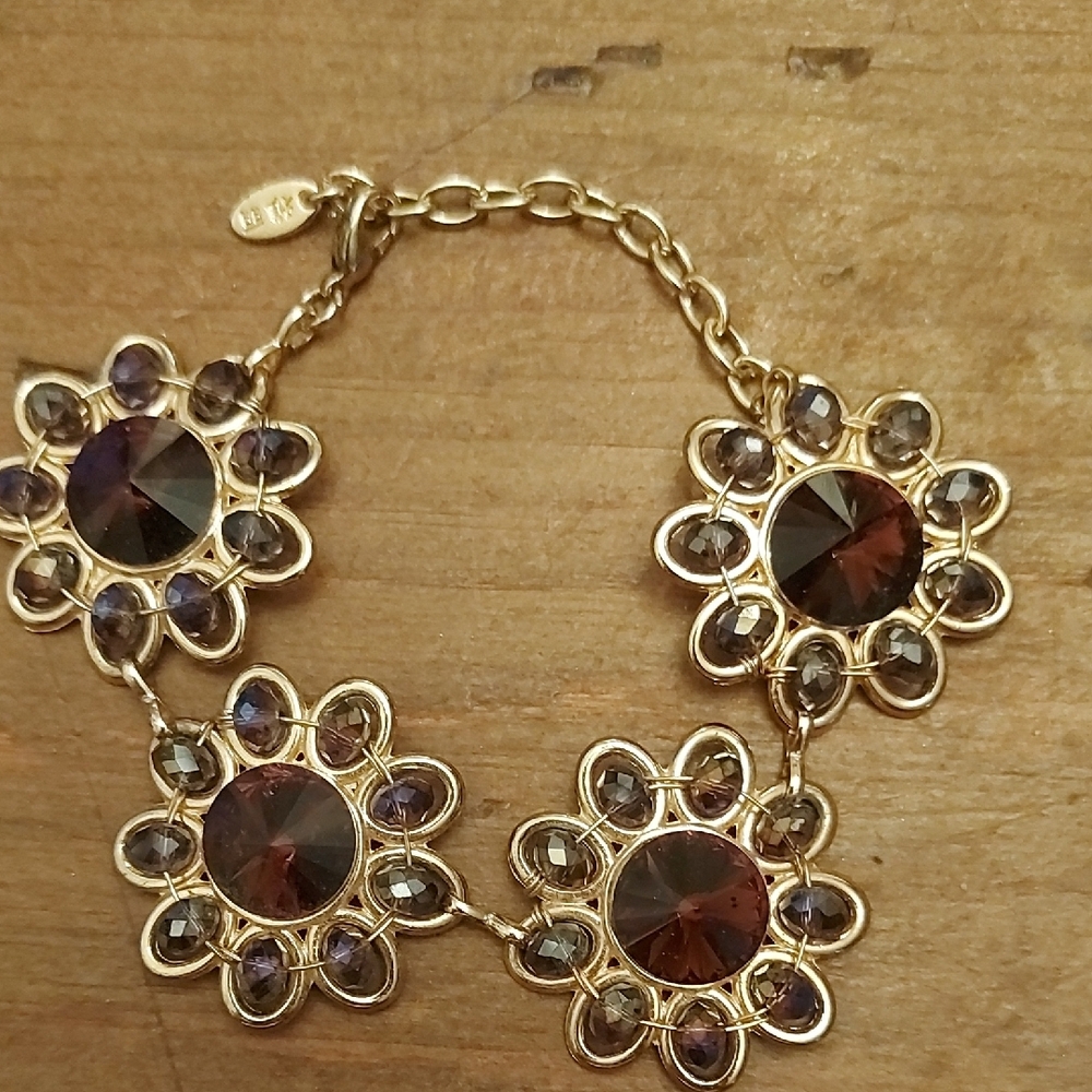 Elegant Gold and Purple Floral Bracelet